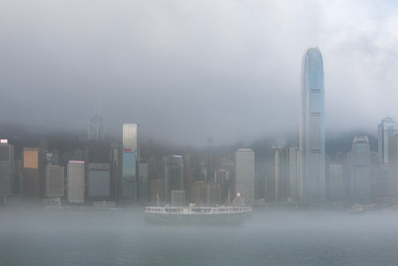 Scenery of Victoria Harbour of Hong Kong city in fog