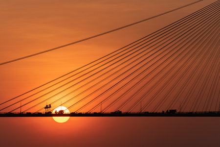 Suspension bridge in Hong Kong under sunsetの写真素材