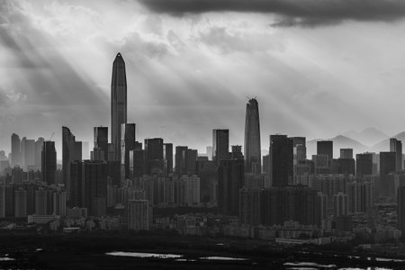 Silhouette of skyline of Shenzhen city, China under sunset. Viewed from Hong Kong borderの写真素材