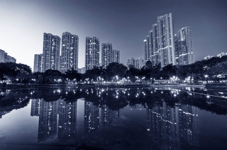 High rise residential building in Hong Kong city at duskの写真素材