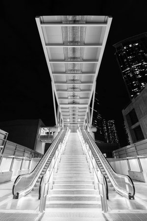 Night scenery of modern escalator in downtown district of Hong Kong cityの写真素材