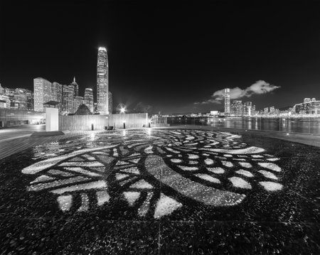 Night scenery of Promenade and skyline of Hong Kong cityの写真素材