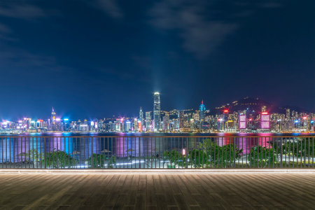 Night scenery of Victoria harbor of Hong Kong cityの写真素材