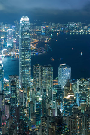 Victoria Harbor of Hong Kong city at nightの写真素材