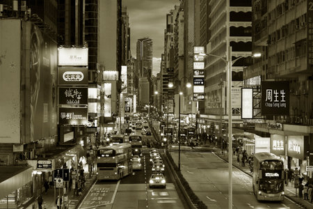 Hong Kong, China - January 20, 2022 : Skyscraper and traffic in Mongkok District in Hong Kong. Mongkok in Kowloon Peninsula is the most busy and overcrowded district in Hong Kongのeditorial素材