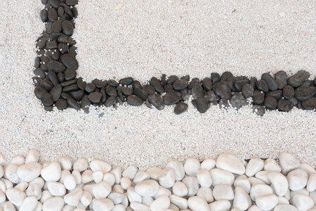 White and black pebble backgroundの写真素材