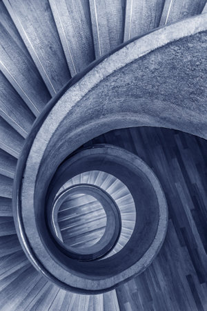 Interior of modern spiral staircase. Contemporary architecture abstract backgroundの写真素材