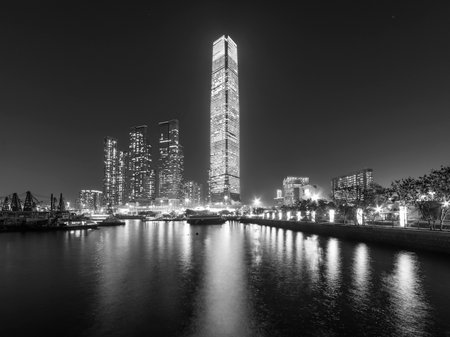 Night scenery of skyscraper, skyline and harbor of Hong Kong cityのeditorial素材