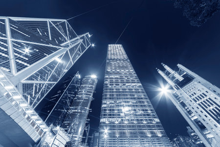 Skyscraper in downtown district of Hong Kong city at nightのeditorial素材