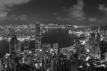 Scenery of Victoria harbor of Hong Kong city after midnightの写真素材