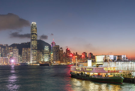 Victoria Harbor of Hong Kong city at duskのeditorial素材