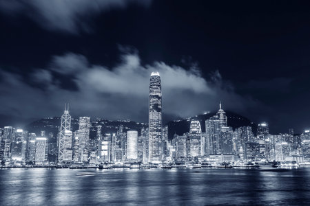 Night scenery of Victoria harbor of Hong Kong cityの写真素材
