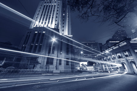 traffic in downtown of Hong Kong city at nightの写真素材
