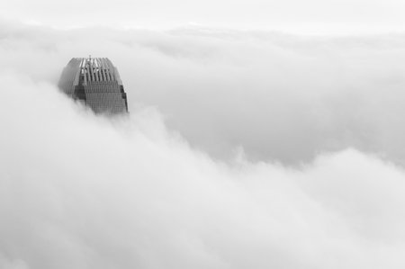 Skyscraper in Hong Kong  city shrouded in fogのeditorial素材