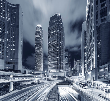 traffic in central district of Hong Kong city at nightのeditorial素材