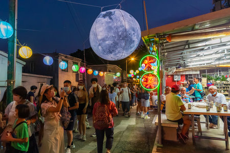 Hong Kong, China - September 11, 2021 : People visiting Tai O Lantern Festival for Mid-autumn celebration in historical landmark fishing village Tai O in lantau islandのeditorial素材