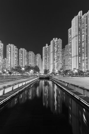 High rise residential building of public estate in Hong Kong at nightの写真素材