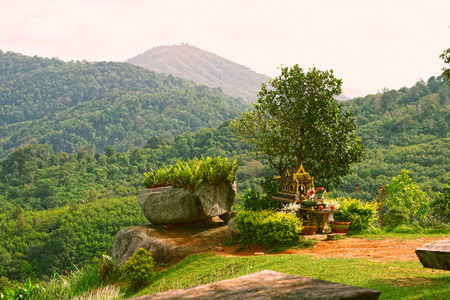 Outdoor spirit house in Phuket, Thailand. Mountainsの写真素材
