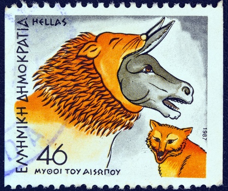 GREECE - CIRCA 1987  A stamp printed in Greece from the  Aesop's Fables  issue showing  The Ass in a Lion's Skin and the Fox , circa 1987  の写真素材