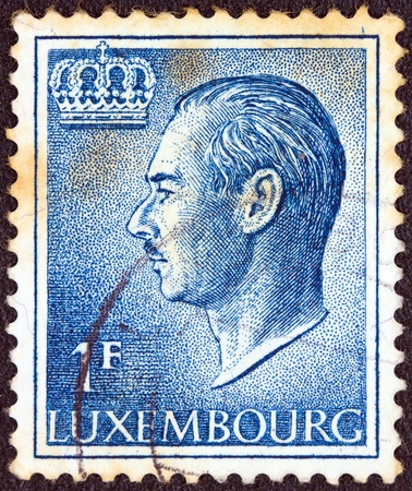 LUXEMBOURG - CIRCA 1965: A stamp printed in Luxembourg showing a portrait of Grand Duke Jean, circa 1965. のeditorial素材