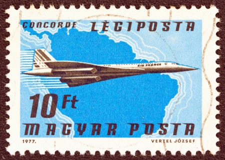 HUNGARY - CIRCA 1977: A stamp printed in Hungary from the "Planes, Airlines and Maps" issue shows an Aerospatiale-BAC Concorde, Air France and South America map, circa 1977. のeditorial素材