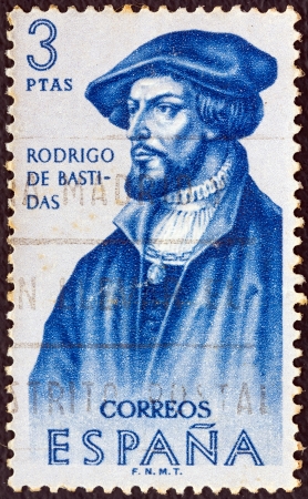 SPAIN - CIRCA 1961: A stamp printed in Spain from the "Explorers and Colonizers of America (1st series)" issue shows conquistador and explorer Rodrigo de Bastidas, circa 1961. のeditorial素材