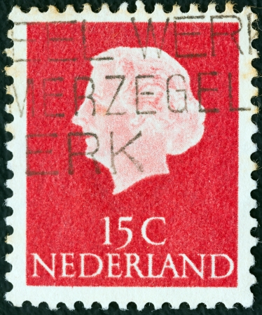 NETHERLANDS - CIRCA 1953: A stamp printed in the Netherlands shows Queen Juliana, circa 1953. のeditorial素材
