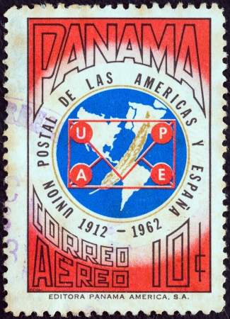 PANAMA - CIRCA 1962: A stamp printed in Panama issued for the 50th anniversary of the founding of the Postal Union of the Americas and Spain, UPAE, shows map of America and Spain, circa 1962. のeditorial素材