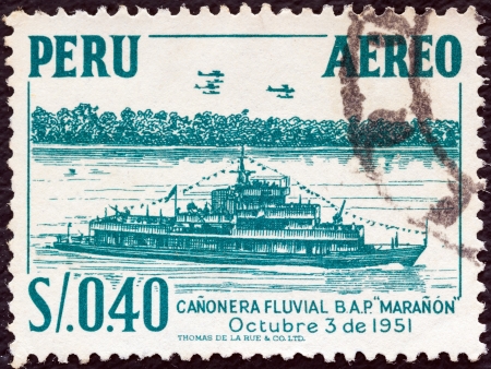 PERU - CIRCA 1952: A stamp printed in Peru shows gunboat Maranon, circa 1952. のeditorial素材