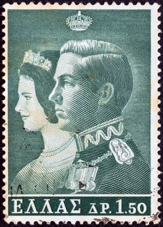 GREECE - CIRCA 1964: A stamp printed in Greece from the "Royal Wedding" issue shows King Constantine II and Queen Anne-Marie, circa 1964. のeditorial素材