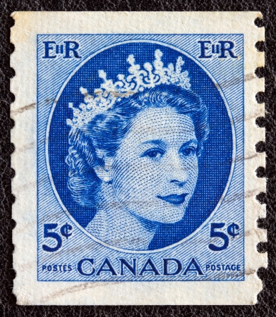 CANADA - CIRCA 1954: A stamp printed in Canada shows a portrait of Queen Elizabeth II, circa 1954. のeditorial素材