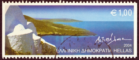 GREECE - CIRCA 2004: A stamp printed in Greece from the "Island Views" issue shows a panorama from Astypalaia island, circa 2004. のeditorial素材