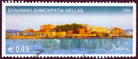 GREECE - CIRCA 2004: A stamp printed in Greece from the "Island Views" issue shows a panorama of Chania city harbor, Crete island, circa 2004. のeditorial素材