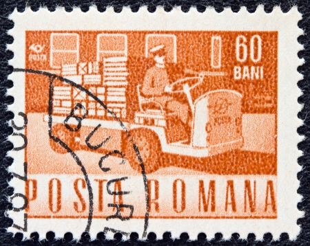 ROMANIA - CIRCA 1967: A stamp printed in Romania shows an Electric parcels truck, circa 1967. のeditorial素材