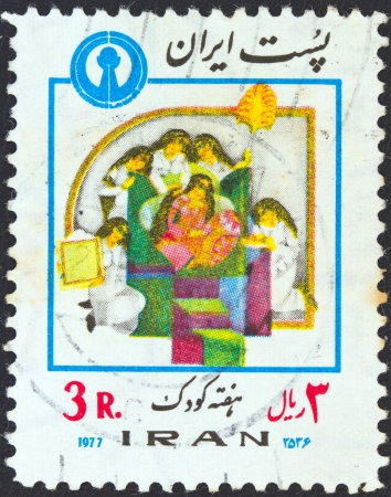 IRAN - CIRCA 1977: A stamp printed in Iran from the "Children's Week" issue shows little princess with attendants, circa 1977.のeditorial素材