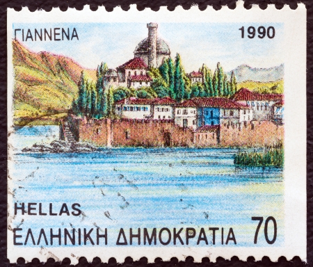 GREECE - CIRCA 1990: A stamp printed in Greece from the "Prefecture Capitals (2nd series)" issue shows lake and island, Ioannina, Epirus, circa 1990. のeditorial素材