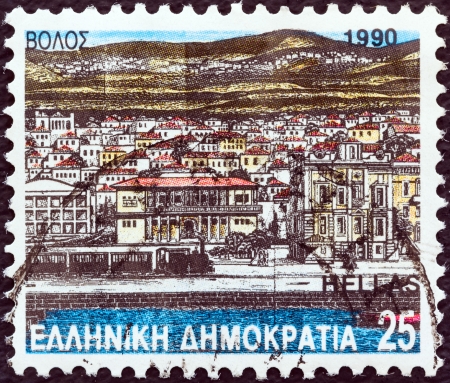 GREECE - CIRCA 1990: A stamp printed in Greece from the "Prefecture Capitals (2nd series)" issue shows City and Town Hall (woodcut, A. Tassos), Volos, Magnesia, circa 1990. のeditorial素材