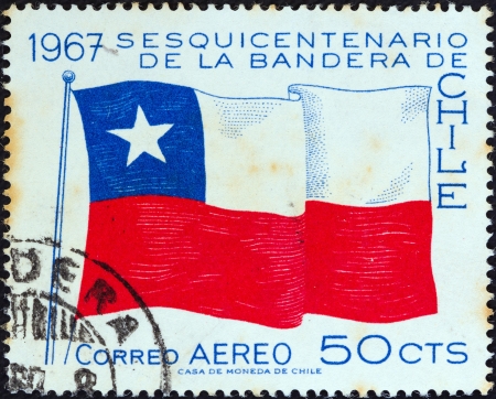 CHILE - CIRCA 1967: A stamp printed in Chile issued for the 150th anniversary of National Flag shows Chilean flag, circa 1967. のeditorial素材