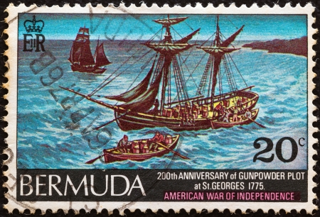 BERMUDA - CIRCA 1975: A stamp printed in Bermuda from the "Bicentenary of Gunpowder Plot, St. George's" issue shows loading gunpowder aboard American ship , circa 1975. のeditorial素材