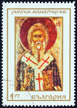 BULGARIA - CIRCA 1968: A stamp printed in Bulgaria from the "Rila Monastery. Icons and murals" issue shows icon of St. Arsenius, circa 1968. のeditorial素材