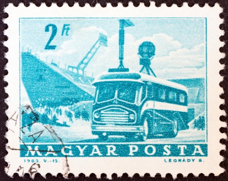 HUNGARY - CIRCA 1963: A stamp printed in Hungary from the "Transport and Communications" ; issue shows T.V. broadcast coach, circa 1963. のeditorial素材
