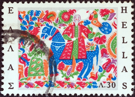 GREECE - CIRCA 1966: A stamp printed in Greece from the "Greek Popular Art" issue shows Horseman (embroidery), circa 1966. のeditorial素材