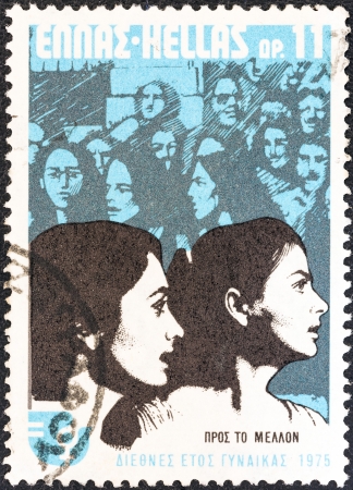 GREECE - CIRCA 1975: A stamp printed in Greece from the "International Women's Year" issue shows women looking to the future, circa 1975. のeditorial素材