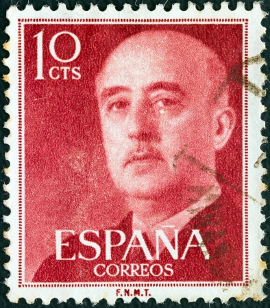 SPAIN - CIRCA 1955: A stamp printed in Spain shows a portrait of Francisco Franco, circa 1955. のeditorial素材