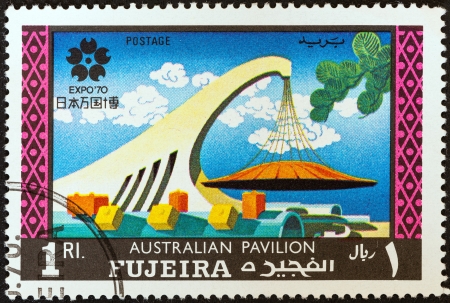 FUJAIRAH EMIRATE - CIRCA 1970: A stamp printed in United Arab Emirates from the \"World\'s Fair - EXPO \'70 - Osaka, Japan\" issue shows Australian pavilion, circa 1970. のeditorial素材