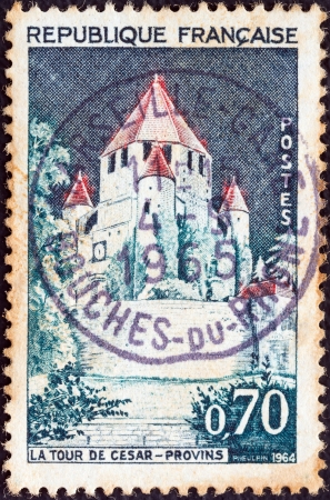 FRANCE - CIRCA 1964: A stamp printed in France shows La Tour de Cesar, Provins, circa 1964. のeditorial素材