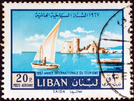 LEBANON - CIRCA 1967: A stamp printed in Lebanon from the \"1967 International year of tourism\" issue shows Sidon, circa 1967. のeditorial素材