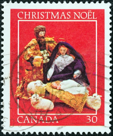 CANADA - CIRCA 1982  A stamp printed in Canada from the  Christmas  Nativity Scenes  issue shows Mary, Joseph and Baby Jesus, circa 1982  のeditorial素材
