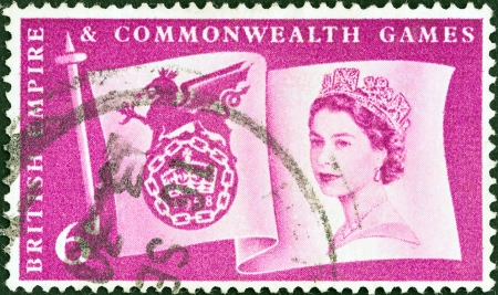 UNITED KINGDOM - CIRCA 1958  A stamp printed in United Kingdom issued for the 6th British Empire and Commonwealth Games, Cardiff shows Queen Elizabeth II, Flag and Games emblem, circa 1958  のeditorial素材