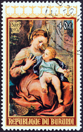 BURUNDI - CIRCA 1976  A stamp printed in Burundi from the  Christmas   issue shows Virgin with Basket  Correggio , circa 1976  のeditorial素材